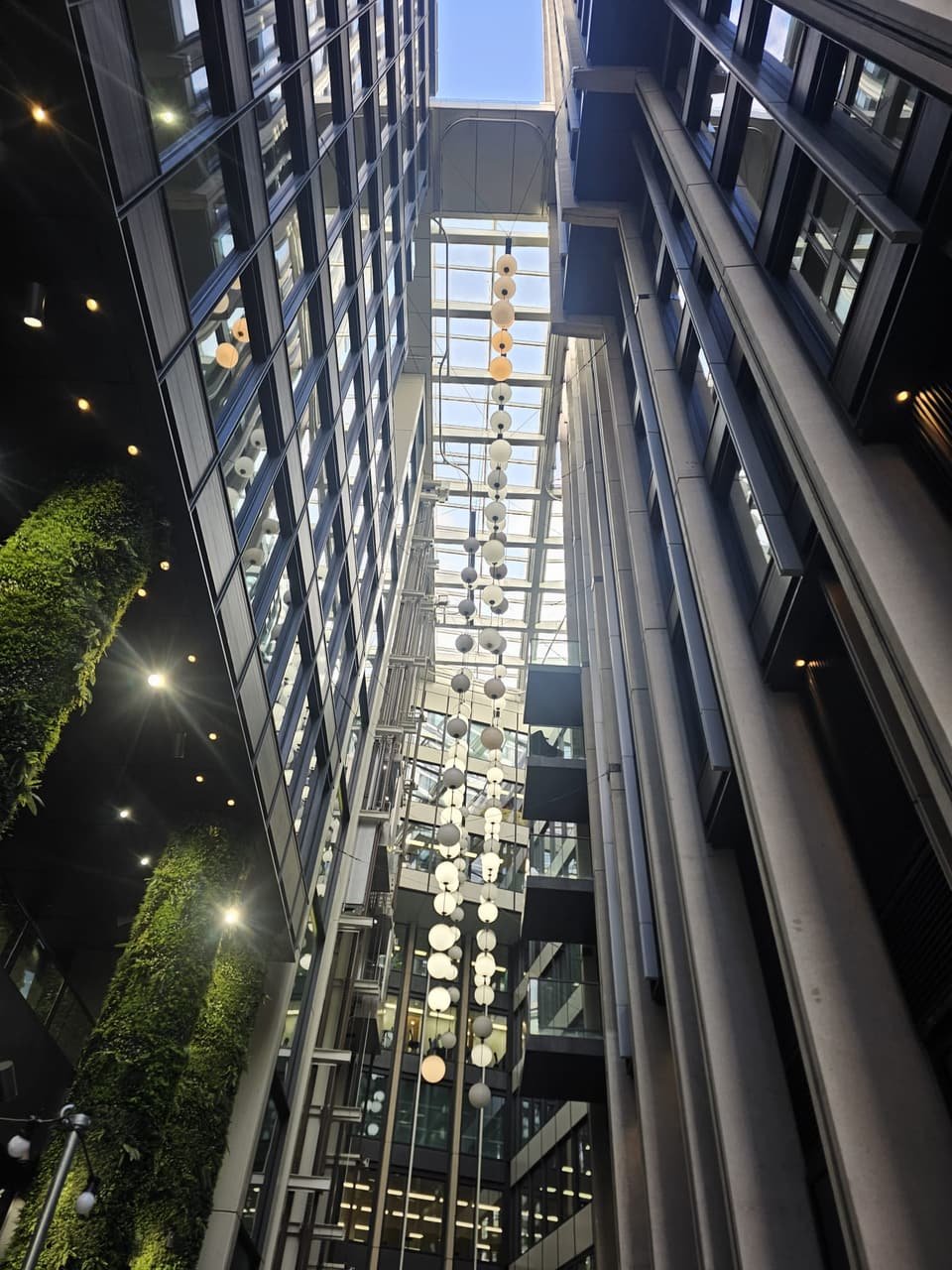 The atrium from inside the building, looking up to the glazed roof